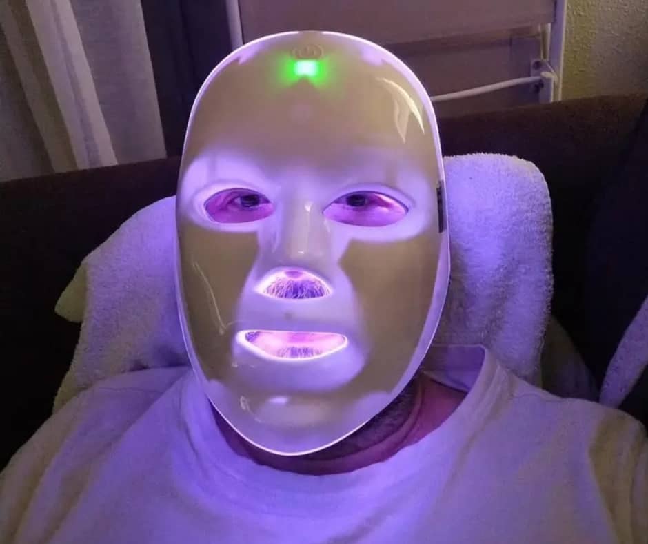 Customer using LED Therapy Mask